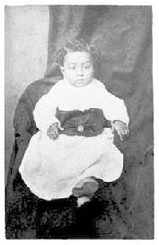 carte de visite portrait of a prison baby (Willis D. Mason, born November 6, 1875) taken by Zalmon Gilbert at his studio in Joliet, Illinois, and appears to be of a child born to a woman held in prison.