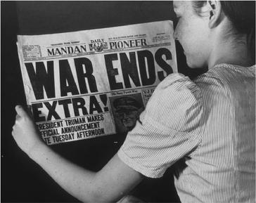 Unidentified Resident Reads Mandan Pioneer